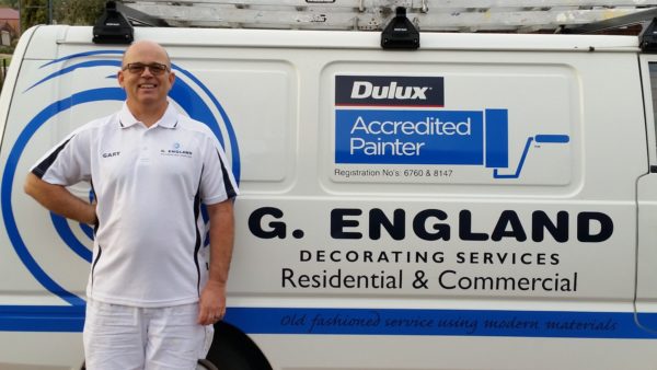 Gary from G England Decorating Services in Perth next to car